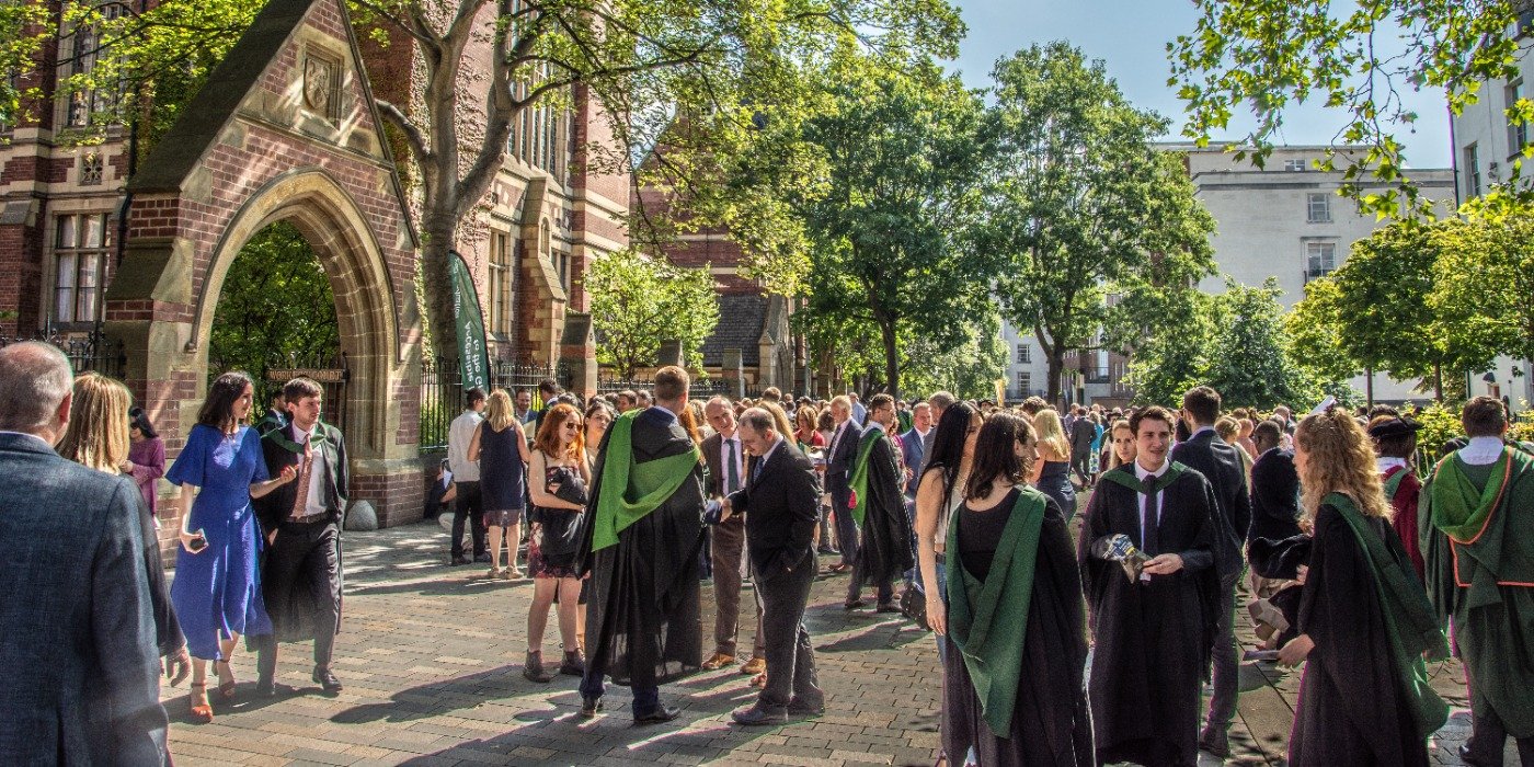 Students in front of the Great Hall during graduation