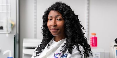 Dr Sigourney Bonner smiles at the camera.