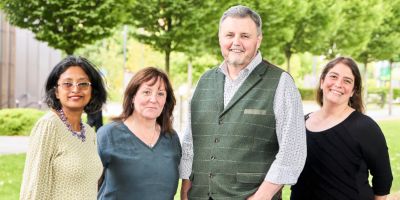 4 people smile at the camera. From left to right: Professor Anwesha Sarkar (UoL) Professor Louise Dye (University of Sheffield) Professor Derek Stewart (James Hutton Institute) and Professor Karen Polizzi (Imperial College)