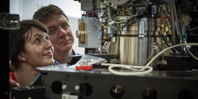 This image shows Professor Neil Ranson and Dr Rebecca Thompson looking at one of the University of Leeds' cryo-electron microscopes