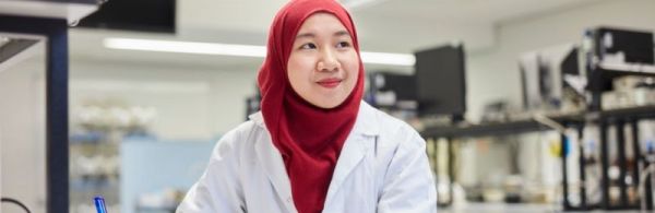 FBS student in lab coat