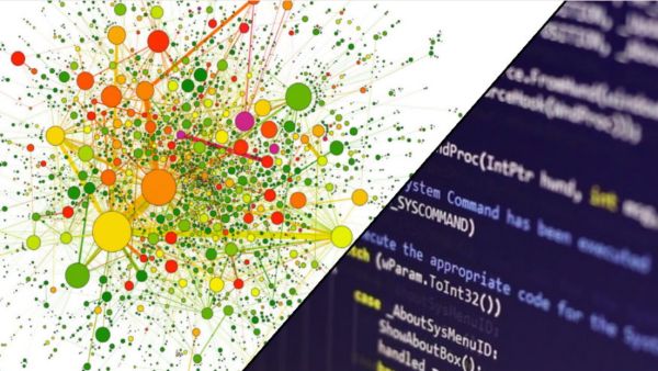 Multicoloured circles connect together. Coding on a computer