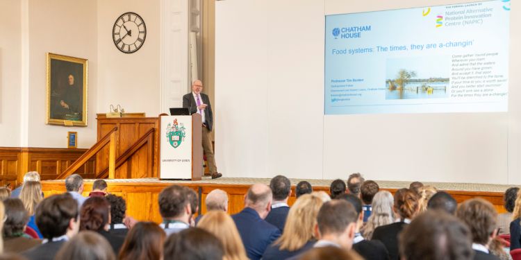 Professor tim benton presents at the napic launch on stage
