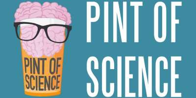 Cartoon of a pint of beer with a brain and wearing glasses.