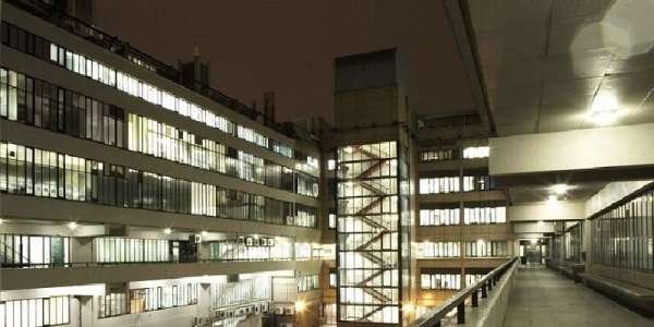 Night shot of the exterior of the EC Stoner Building, home to the Faculty of Biological Sciences